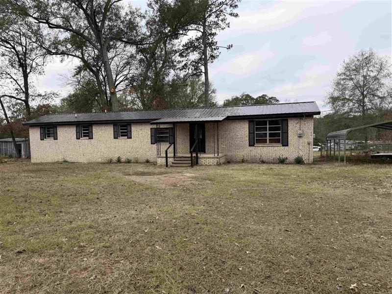 1045 Cypress Circle, Waskom, TX real estate listing by Richie Arnold